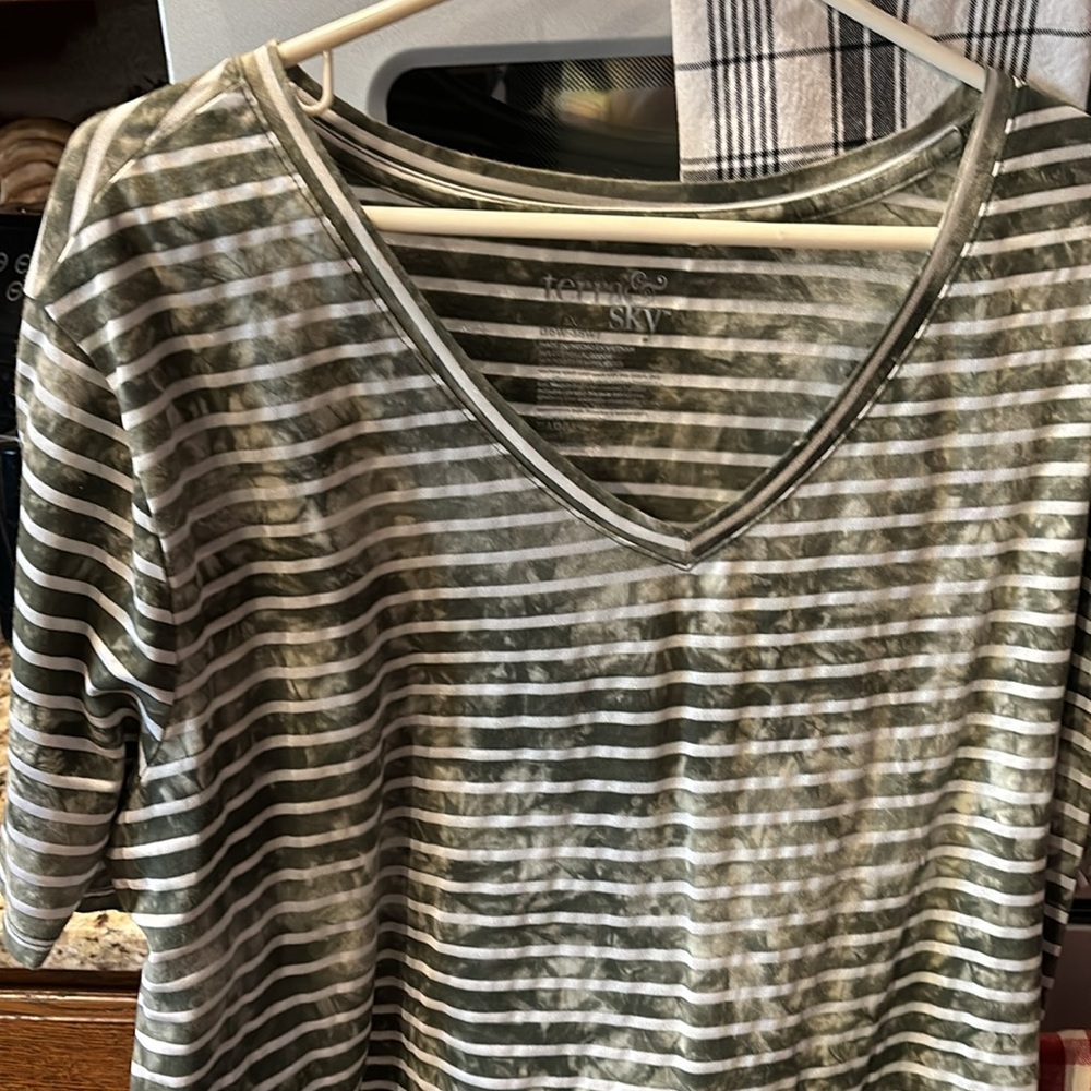 Cute green striped shirt.